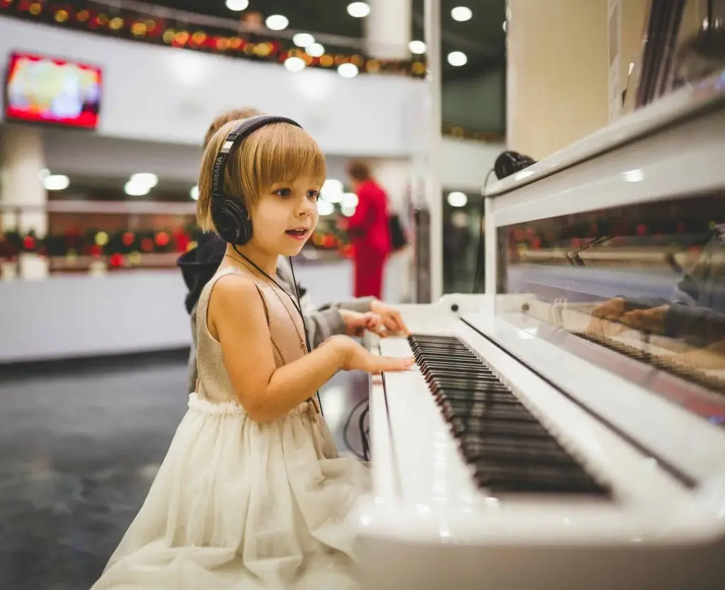 child listening to music