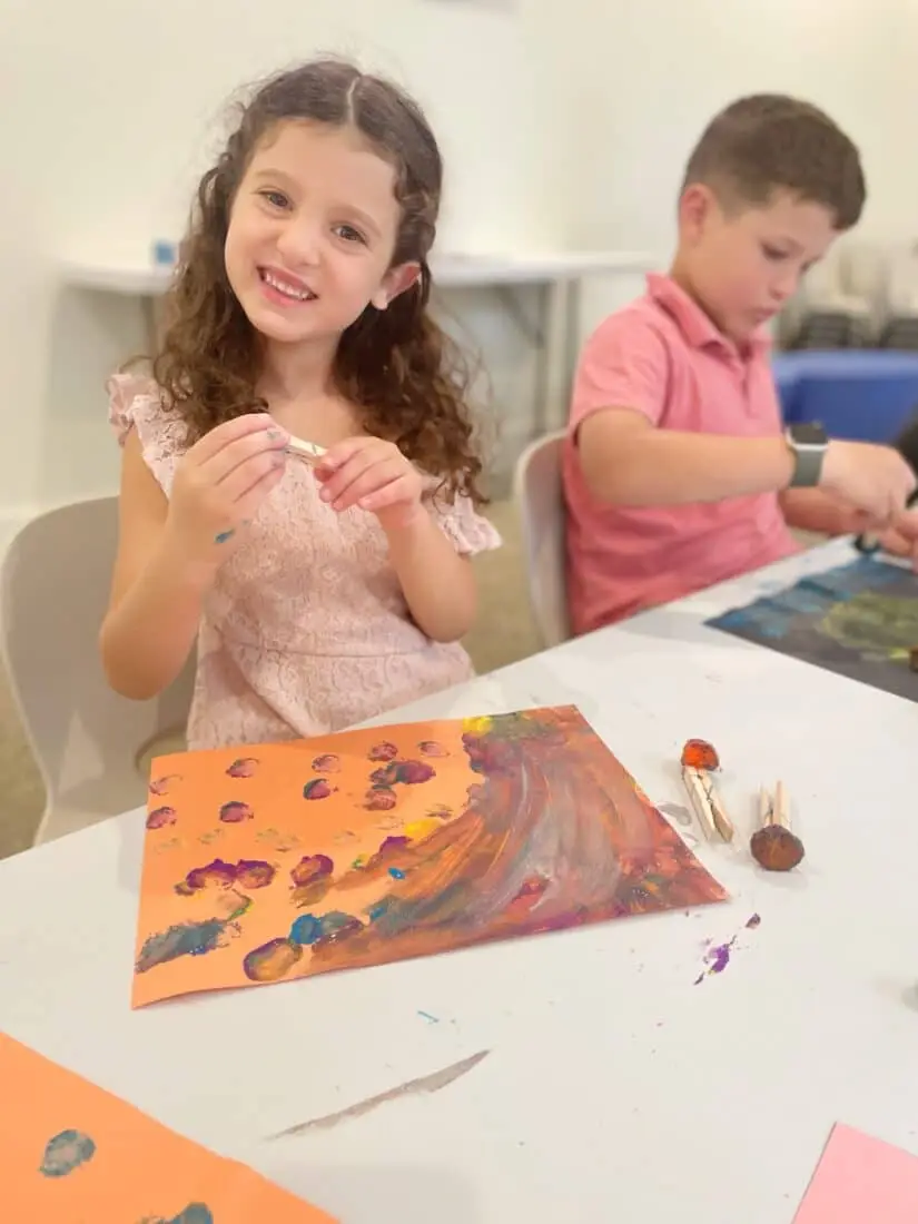 kids doing a craft at ready set fun school break camp