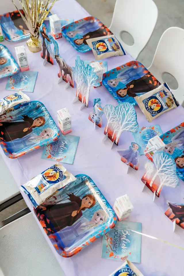 Frozen themed kids birthday party table set up at indoor playground Ready Set Fun in Sandy Springs.