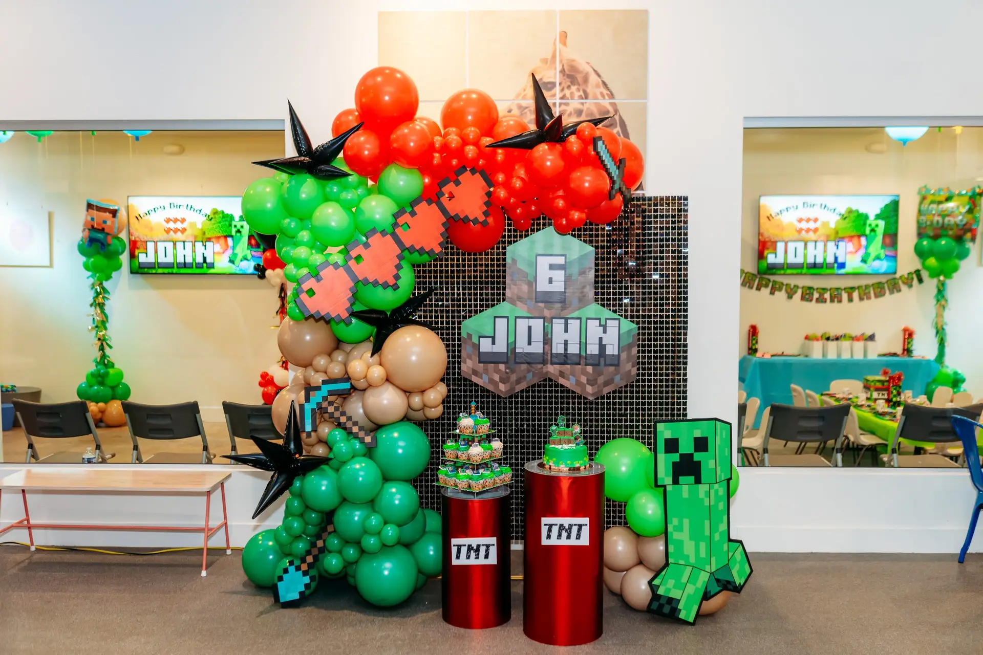 Private kids birthday party at Ready Set FUN Sandy Springs with custom Minecraft themed balloon display and two matching decorated party rooms visible in background