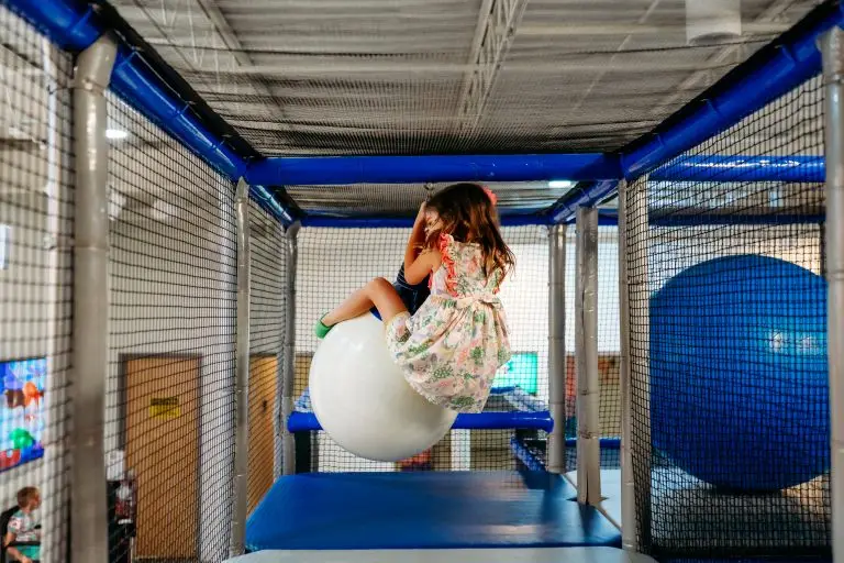 Child playing on indoor playground during sensory-friendly playtime at Ready Set Fun in Sandy Springs